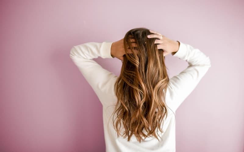 Hair extension pricing guide at a professional salon